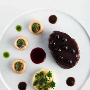 BRAISED BULL’S CHEEKS WITH RED WINE AND BLACKCURRANT, MUSHROOMS FILLED WITH SNAILS, POLENTA CREAM WITH BROCCOLI