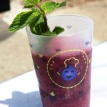 ecocup "Best of Cassis", with strawberry, watermelon & blackcurrant smoothie, with a twig of mint in it